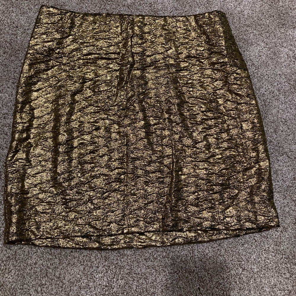Super cute BCBG generation gold skirt. New with tags (NWT). Perfect condition.
